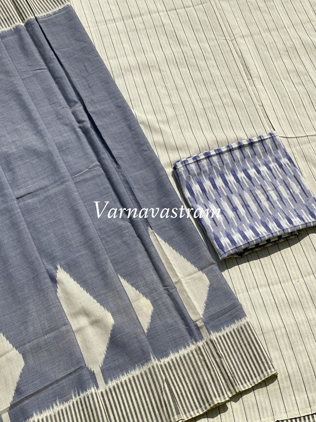 Gorgeous and contemporary powder blue with white weft ikkat cotton Saree