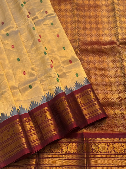 A stunner showstopper Handloom gadwal tissue silk saree with kuttu border