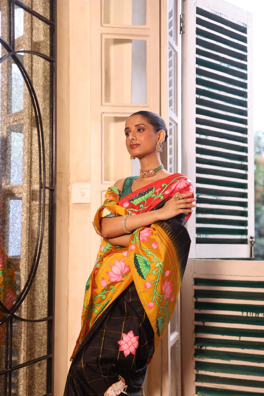 An elegant fusion crafted kanchivaram korvai silk With Pichwai hand painted art