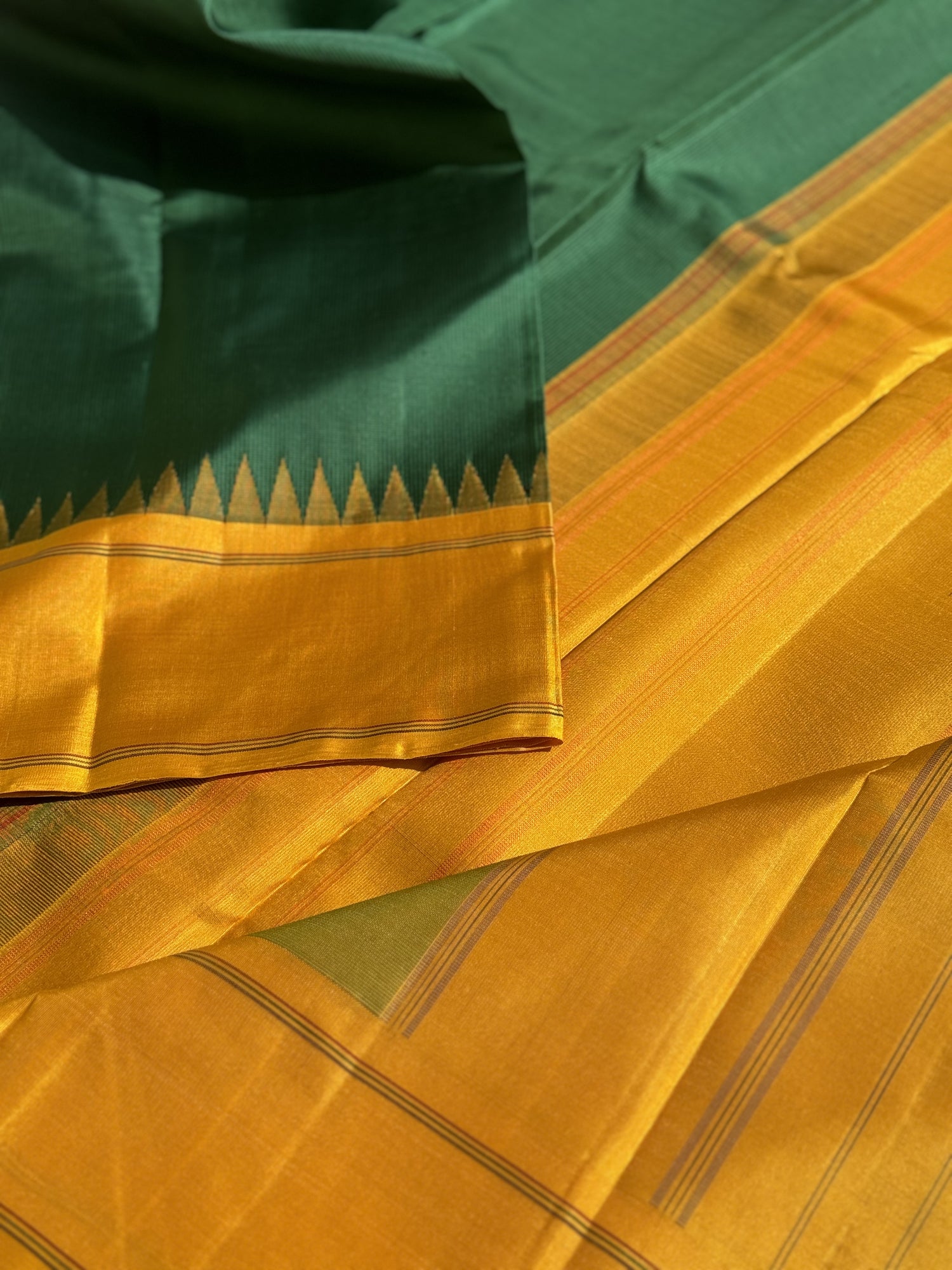 Handwoven Pure Arani Korvai Silk With kasakasa kattam in emerald green with mustard yellow