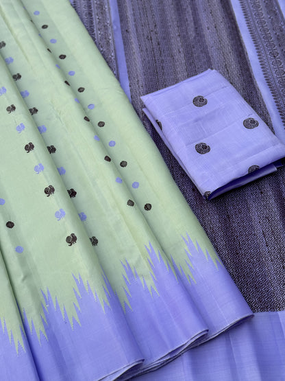 A gorgeous Cardamom green border with lavender temple korvai / kuttu handwoven gadwal silk saree