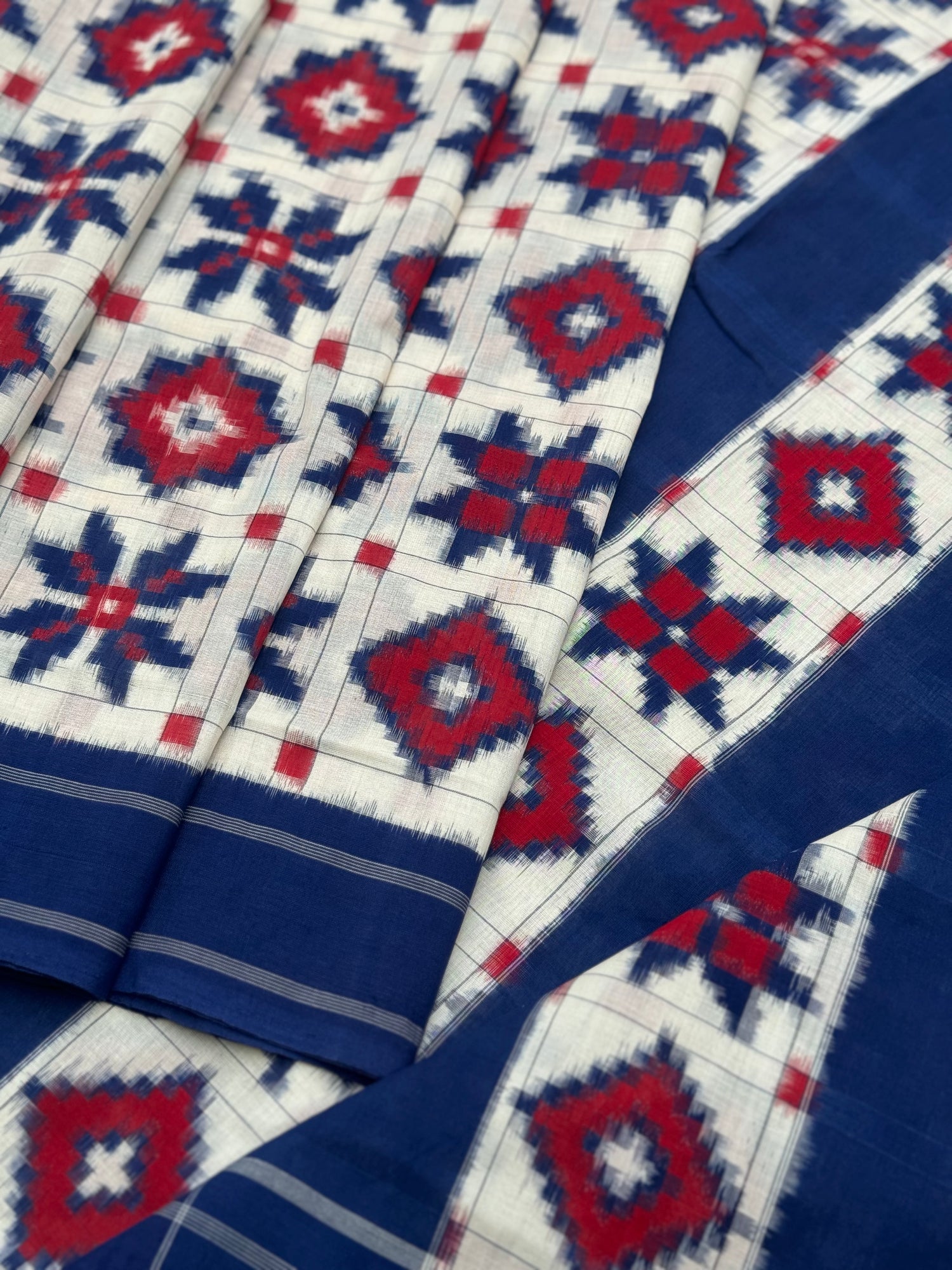 Blue red and white Telia Rumal double ikkat cotton saree