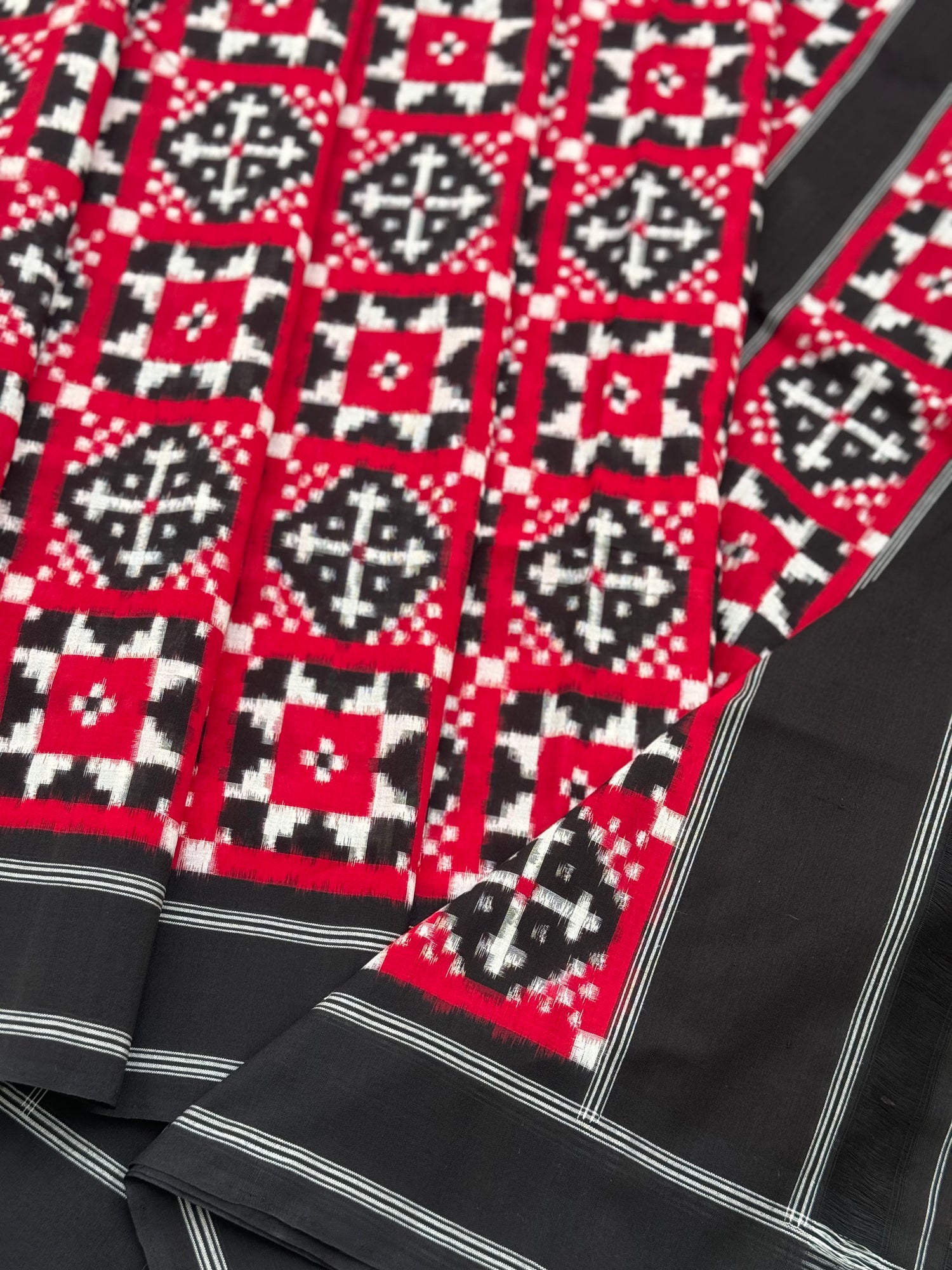 Red and black Telia Rumal double ikkat cotton saree