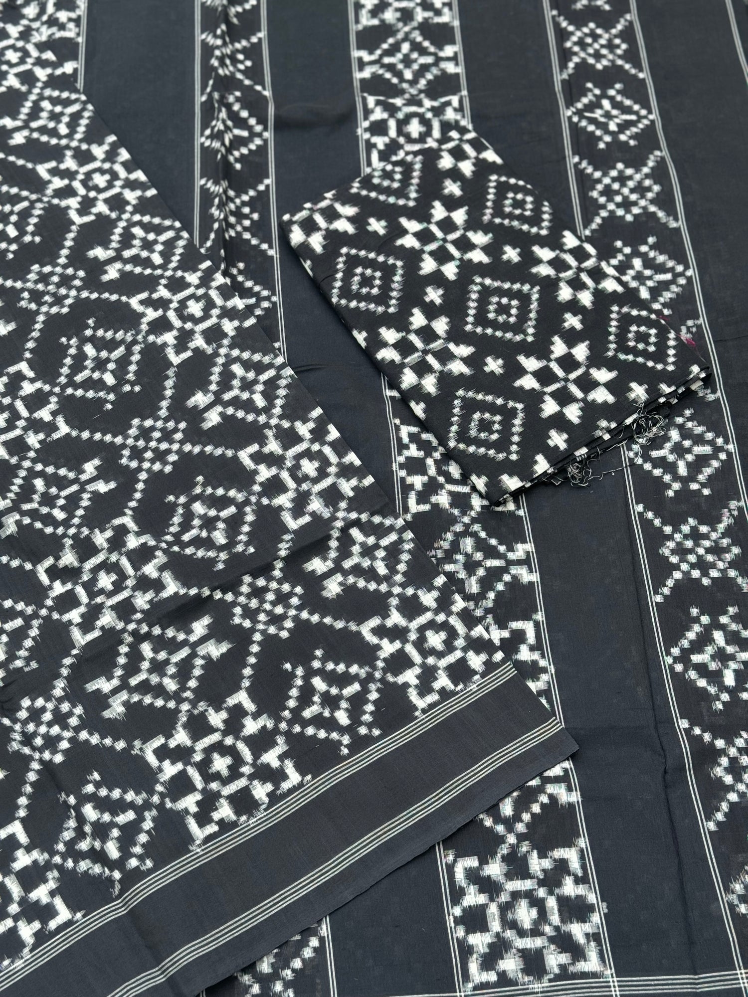 Black and white floral Telia Rumal double ikkat cotton saree