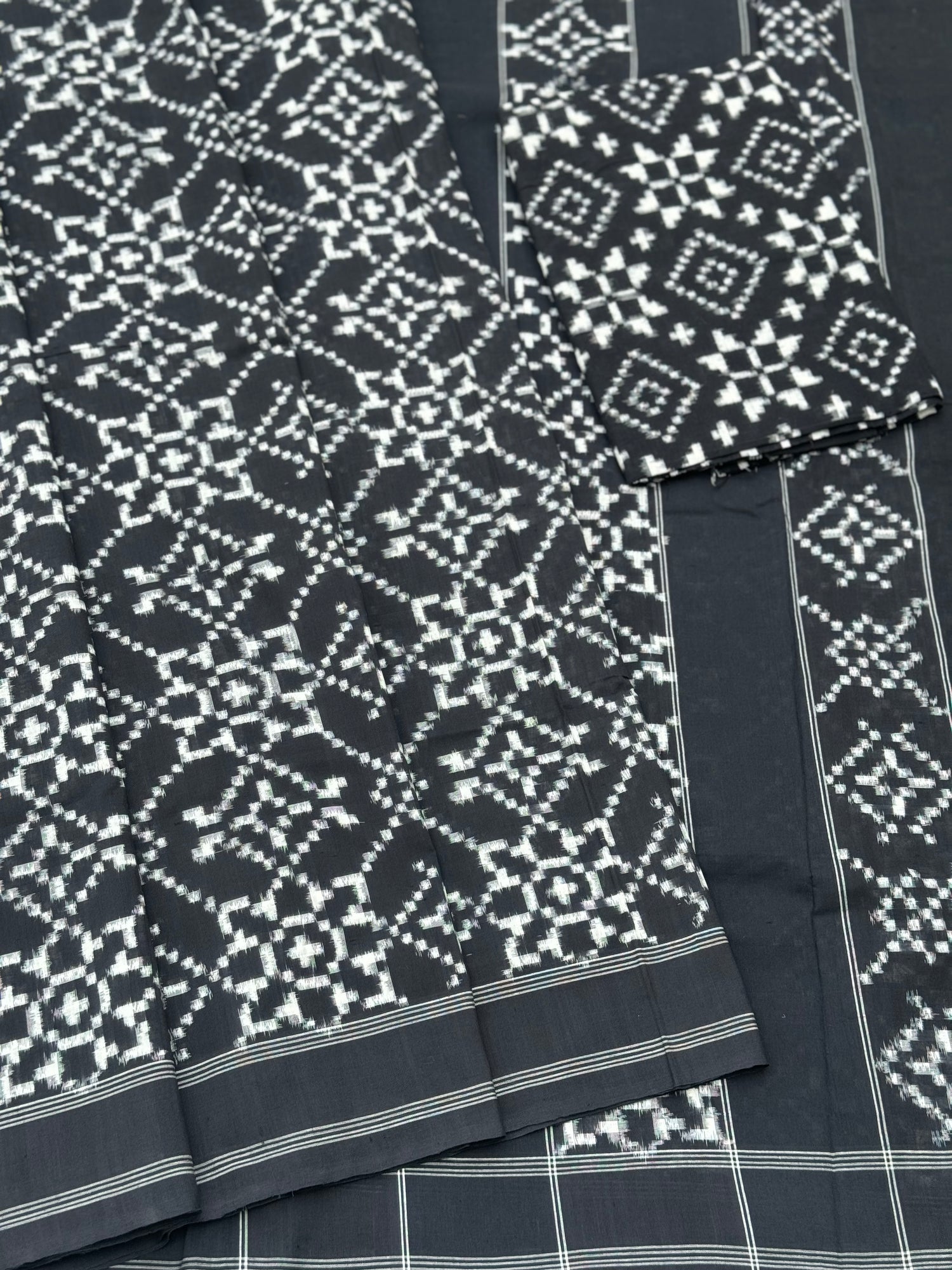Black and white floral Telia Rumal double ikkat cotton saree
