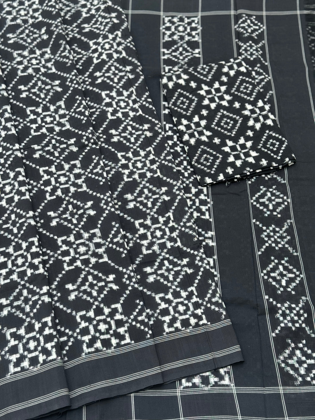 Black and white floral Telia Rumal double ikkat cotton saree