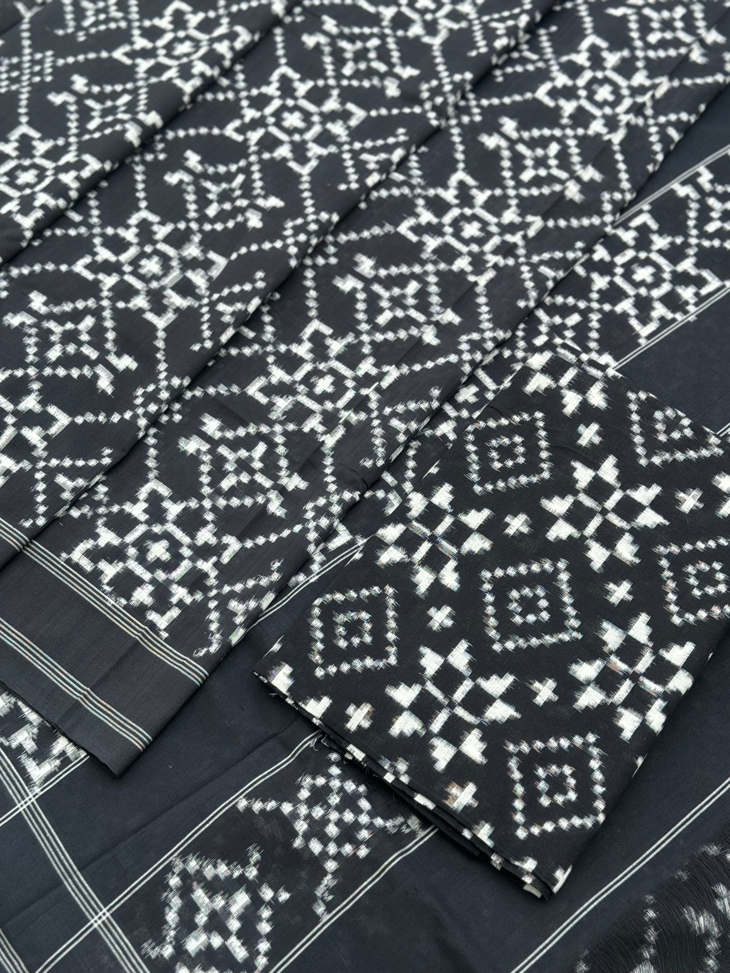 Black and white floral Telia Rumal double ikkat cotton saree