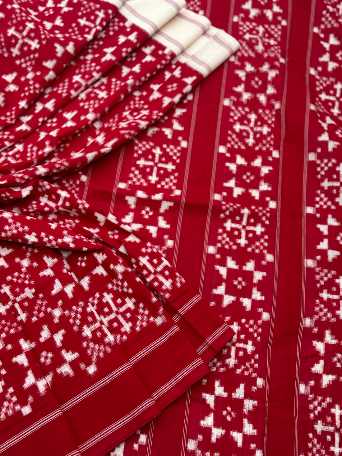 Red and white Telia Rumal double ikkat cotton saree