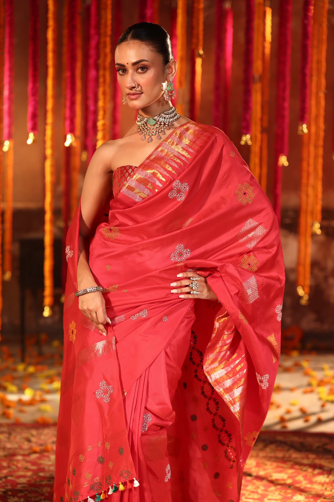 A designer exclusive Chilli Red shade ettukol kanchivaram silk saree with kasuti hand embroidery