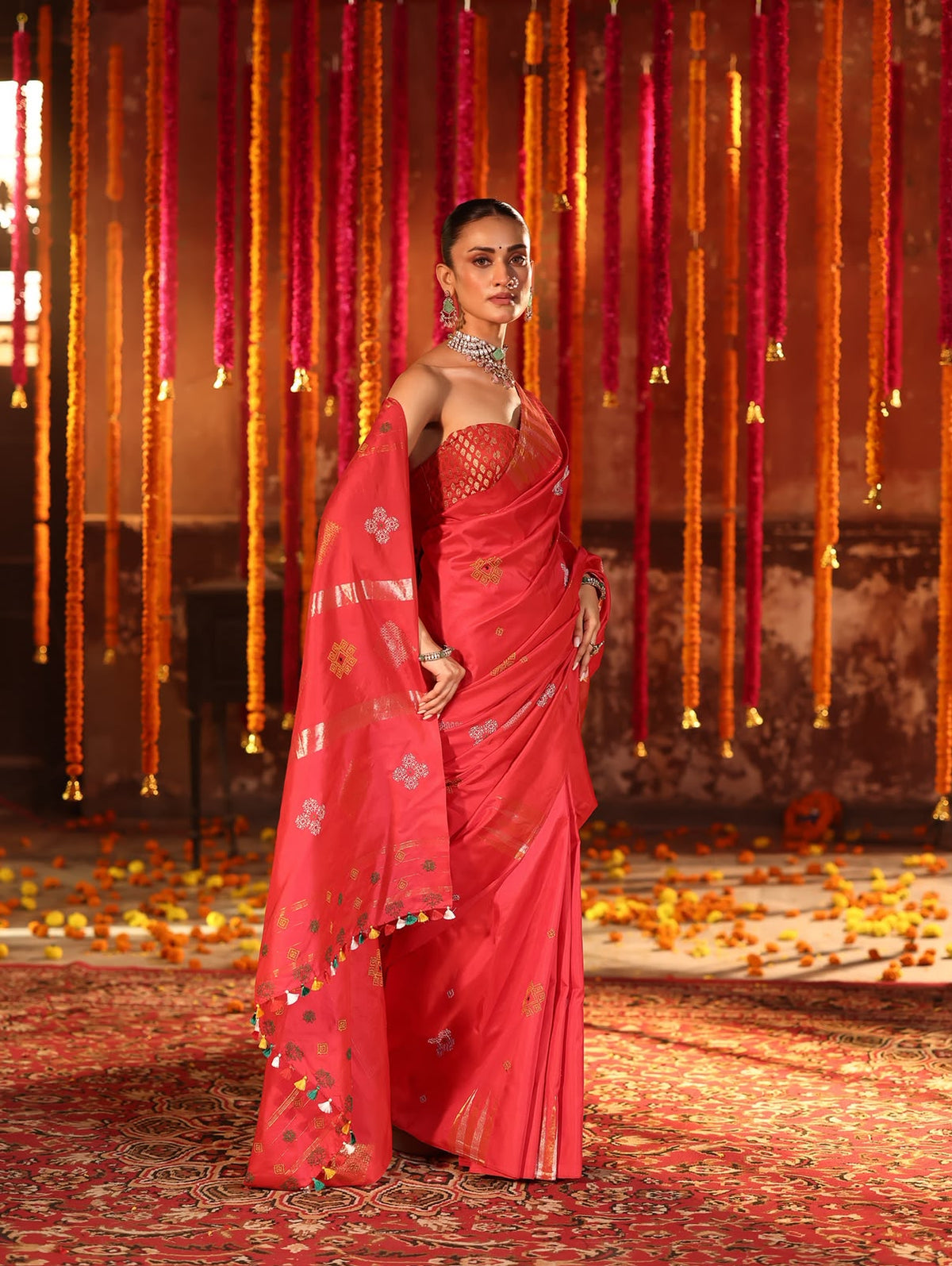 A designer exclusive Chilli Red shade ettukol kanchivaram silk saree with kasuti hand embroidery