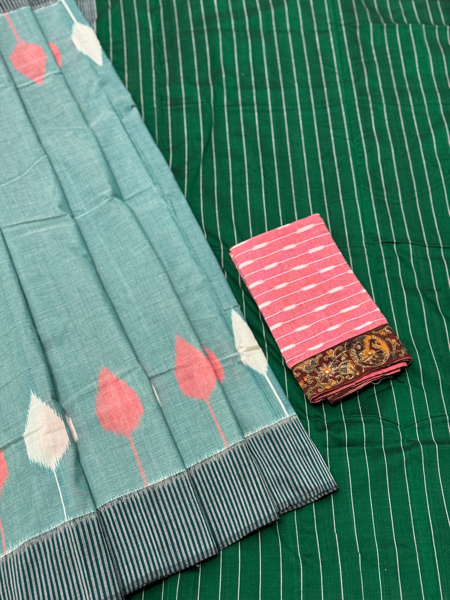 Teal green white handwoven weft single ikkat cotton saree