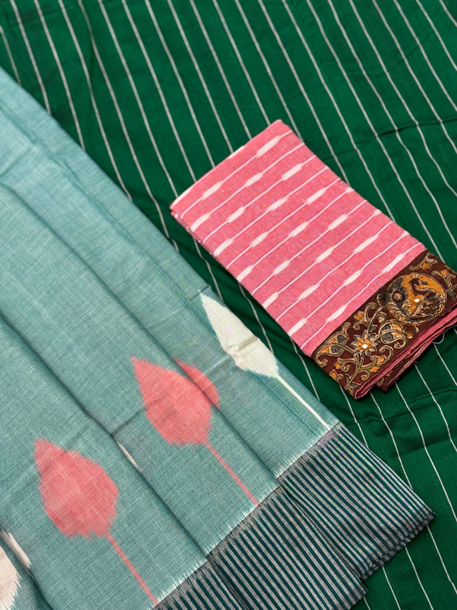 Teal green white handwoven weft single ikkat cotton saree