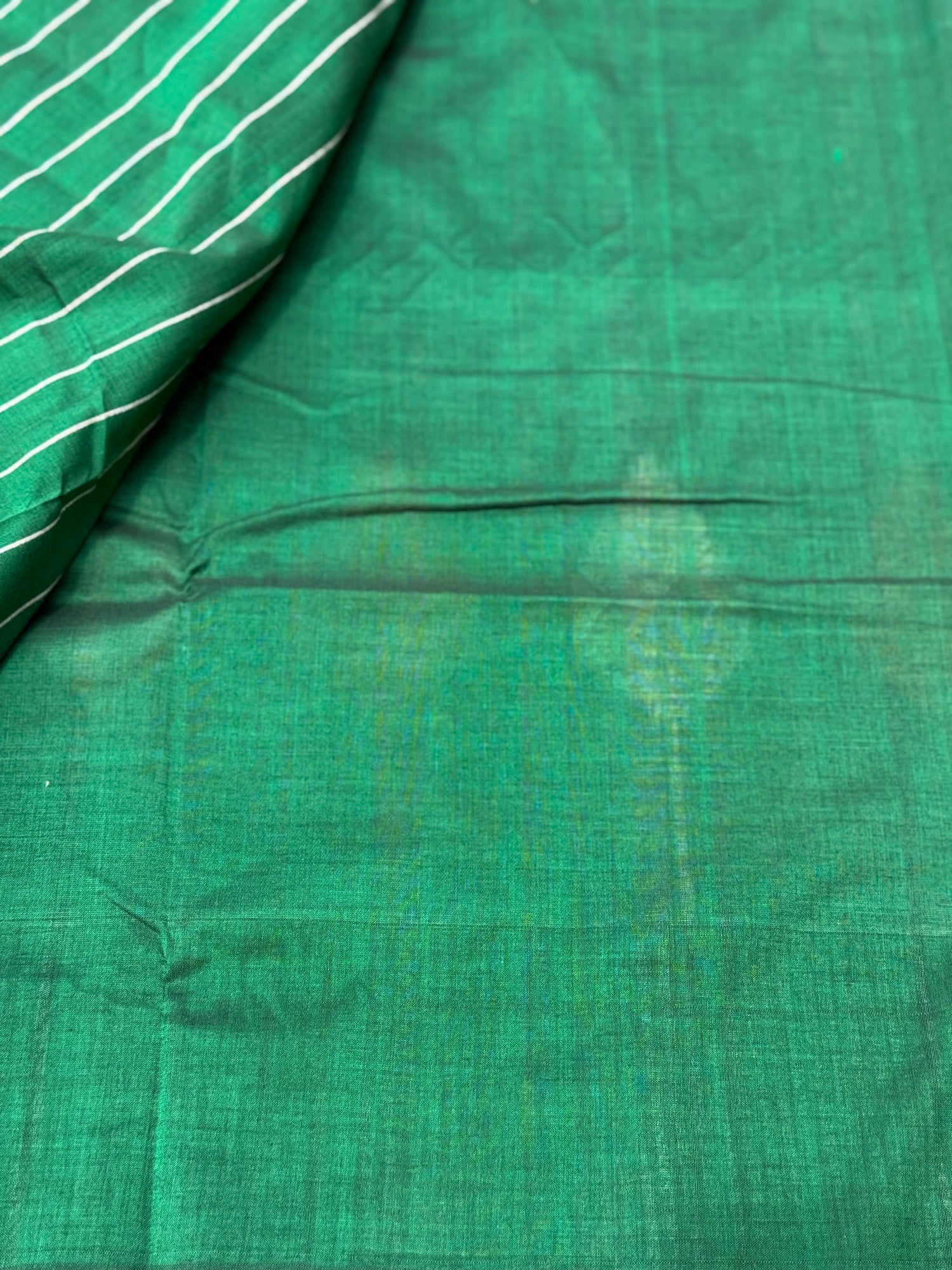 Teal green white handwoven weft single ikkat cotton saree