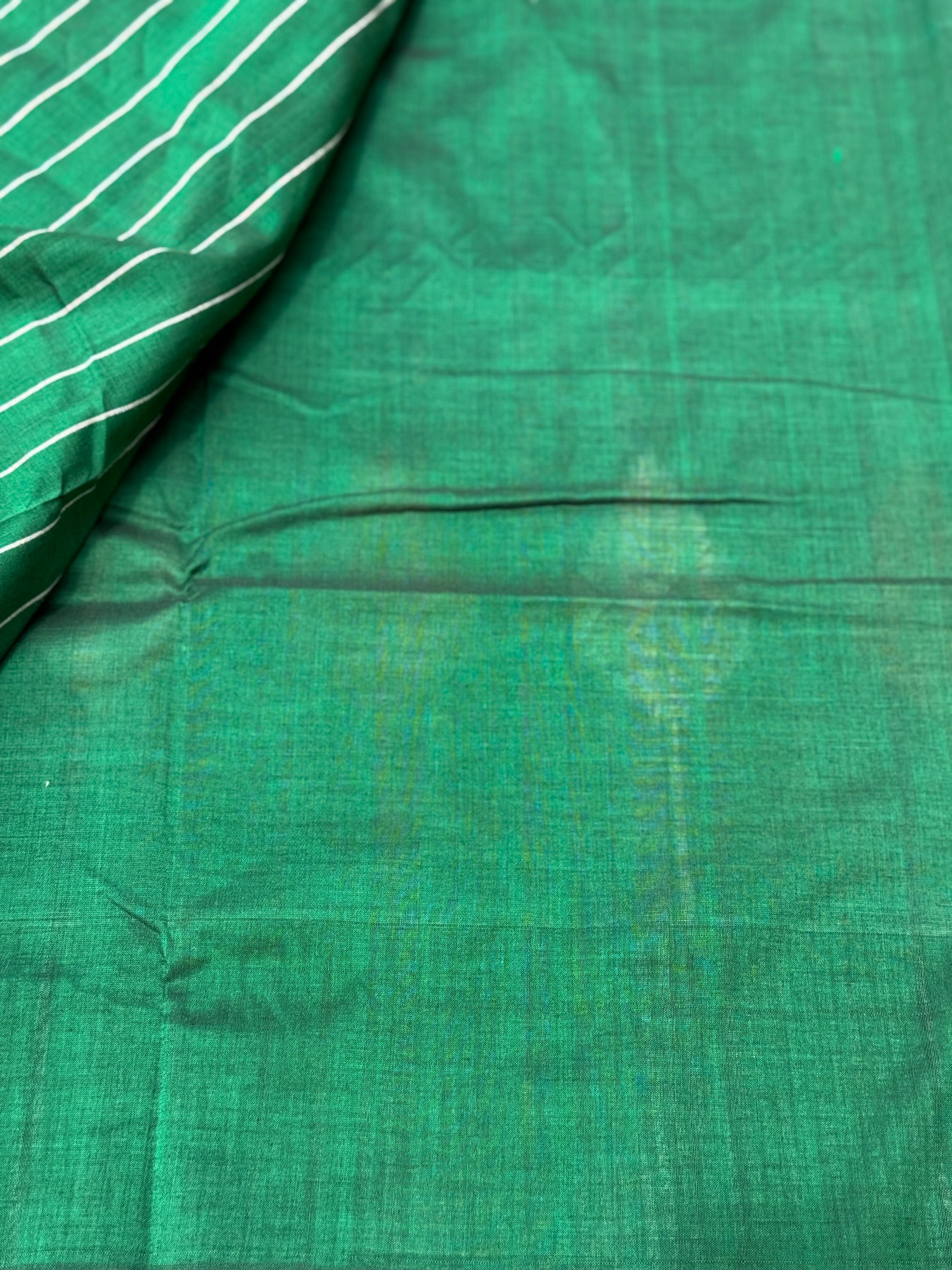 Teal green white handwoven weft single ikkat cotton saree