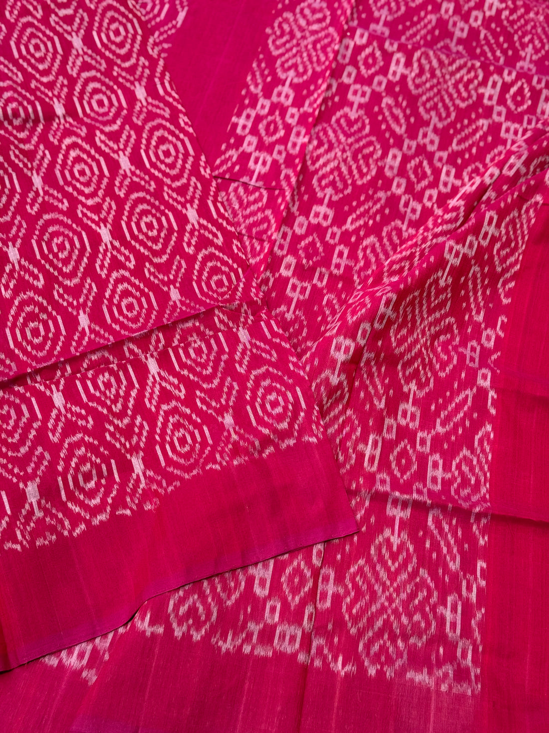 Raspberry pink with white handwoven weft single ikkat cotton saree
