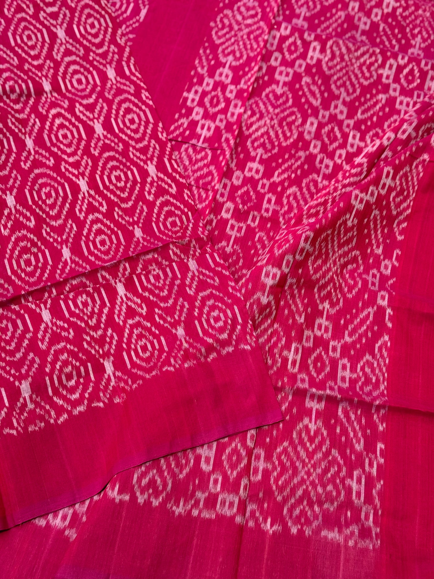 Raspberry pink with white handwoven weft single ikkat cotton saree