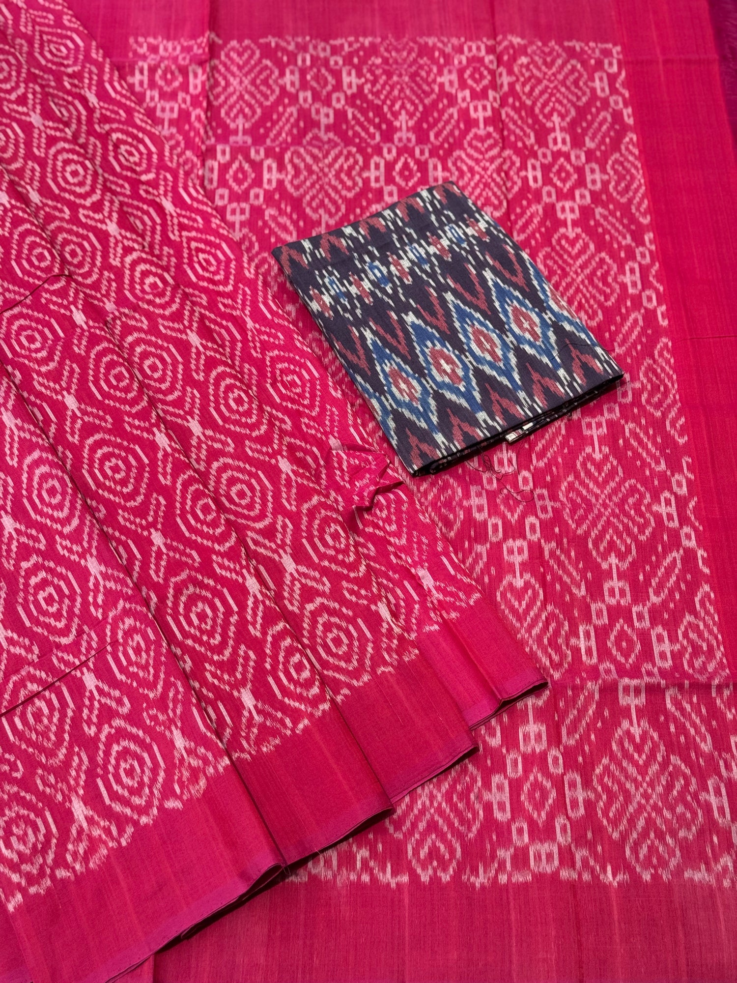 Raspberry pink with white handwoven weft single ikkat cotton saree