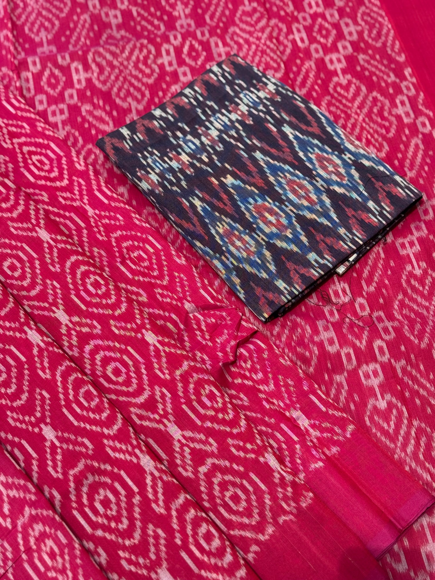 Raspberry pink with white handwoven weft single ikkat cotton saree