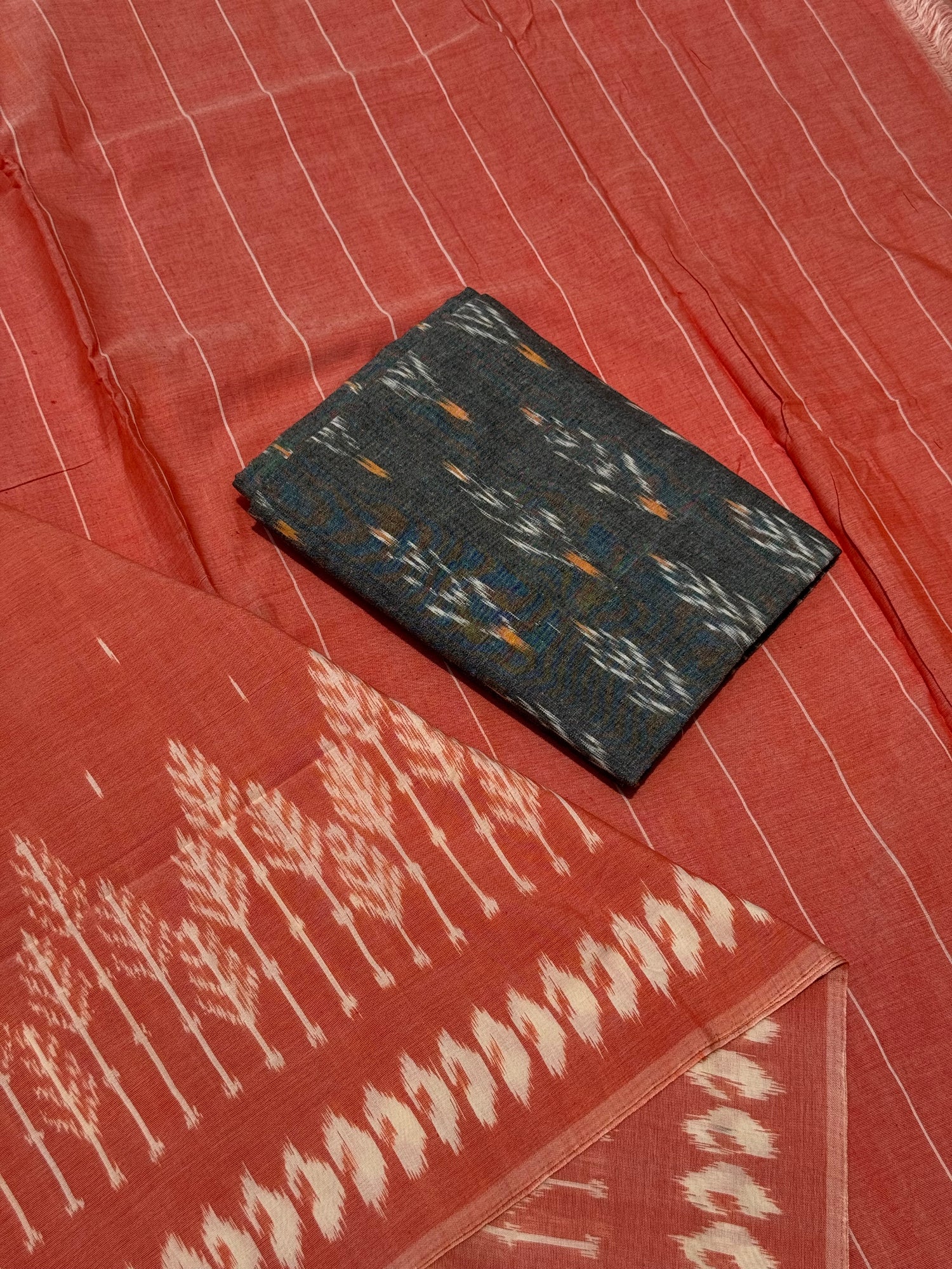 Peach orange with white handwoven weft single ikkat cotton saree