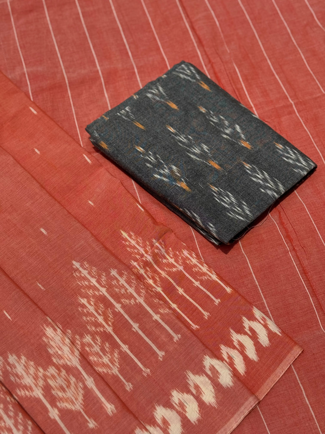 Peach orange with white handwoven weft single ikkat cotton saree