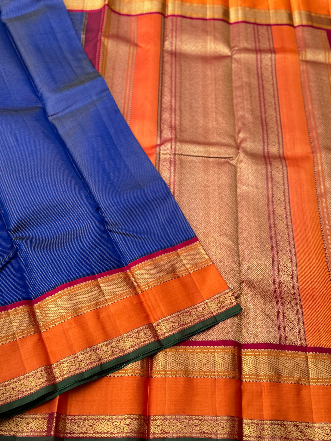 A granduer deep blue with orange zari muthu seer kanchivaram silk saree
