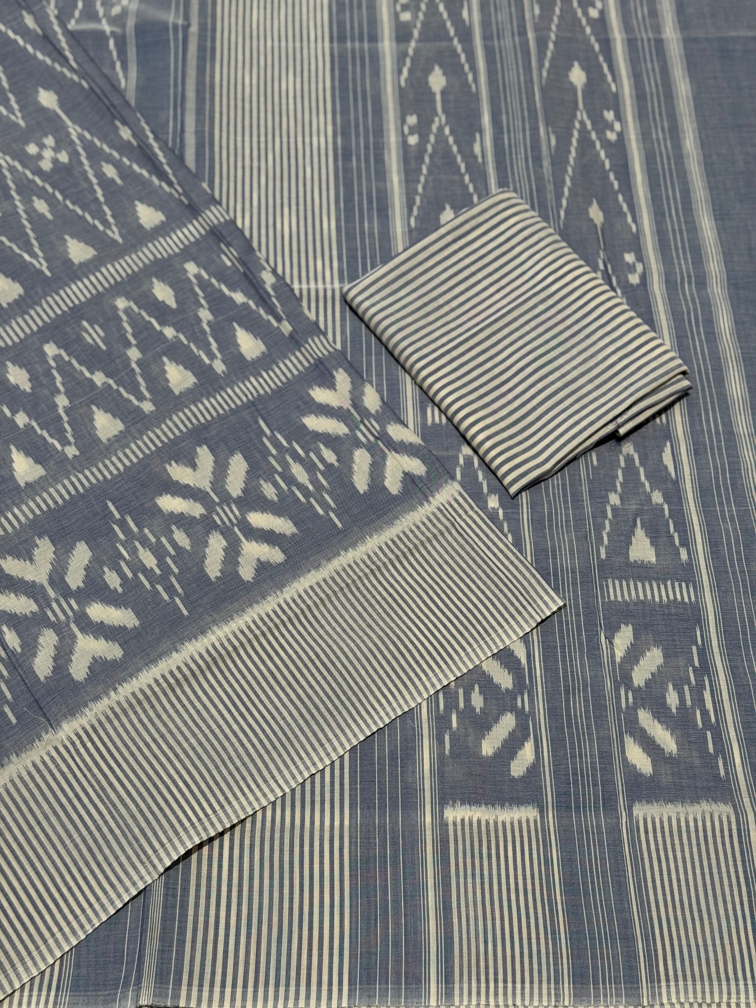 Ivory with powder blue handwoven weft single ikkat cotton saree