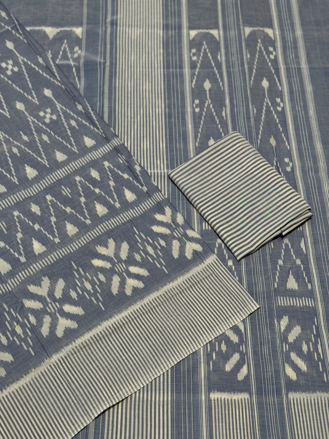 Ivory with powder blue handwoven weft single ikkat cotton saree