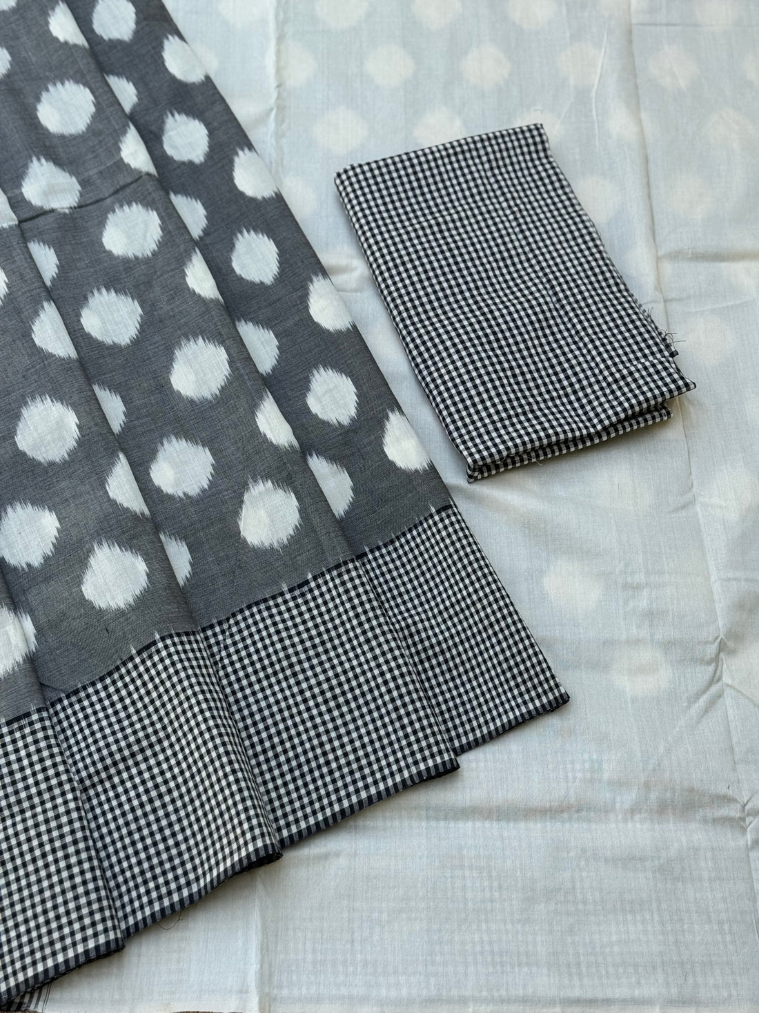 Black white handwoven weft single ikkat cotton saree