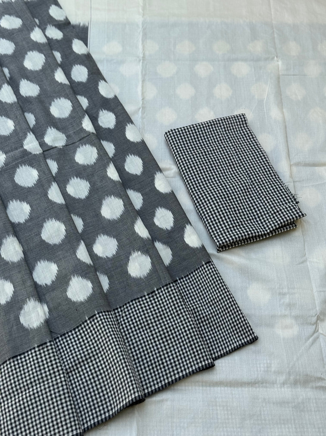 Black white handwoven weft single ikkat cotton saree