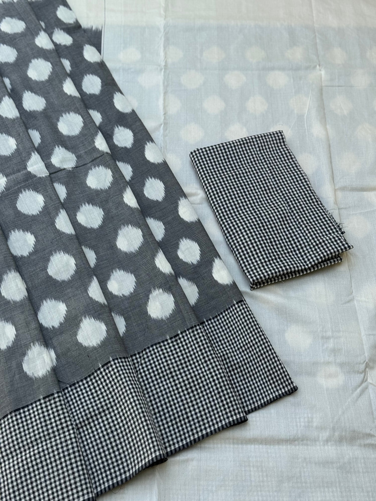 Black white handwoven weft single ikkat cotton saree