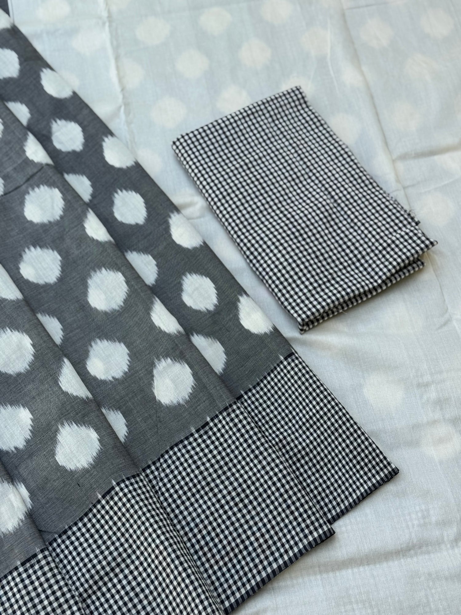 Black white handwoven weft single ikkat cotton saree
