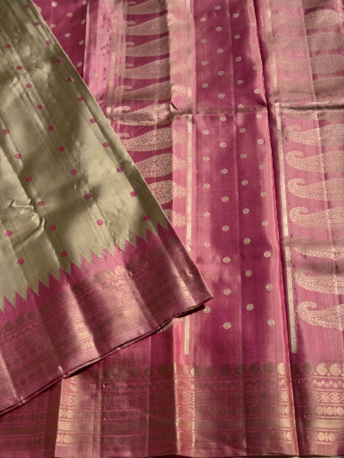 A soft and lustrous Handwoven kuttu gadwal silk saree in purple with red