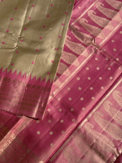 A soft and lustrous Handwoven kuttu gadwal silk saree in purple with red