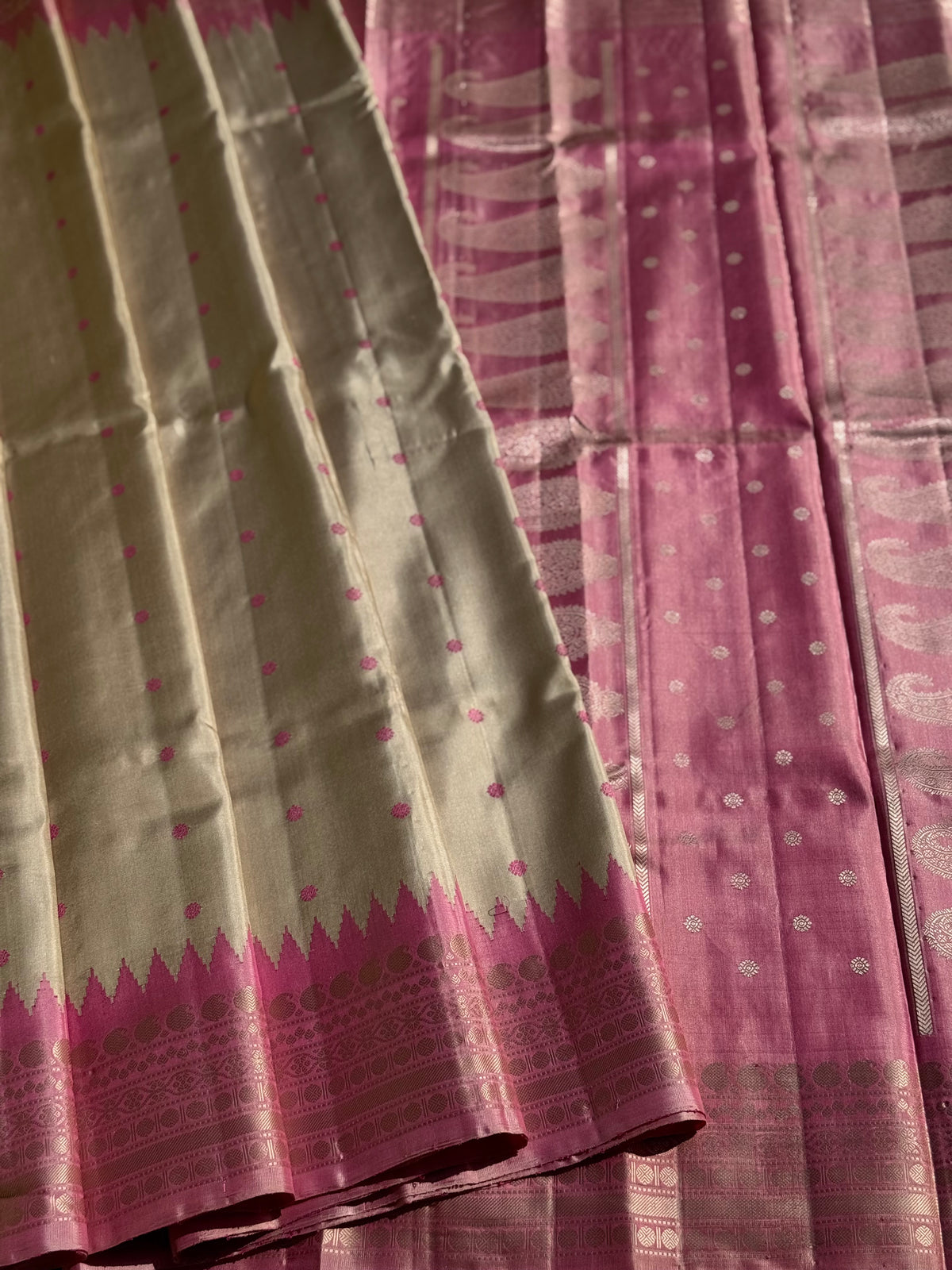 A soft and lustrous Handwoven kuttu gadwal silk saree in purple with red