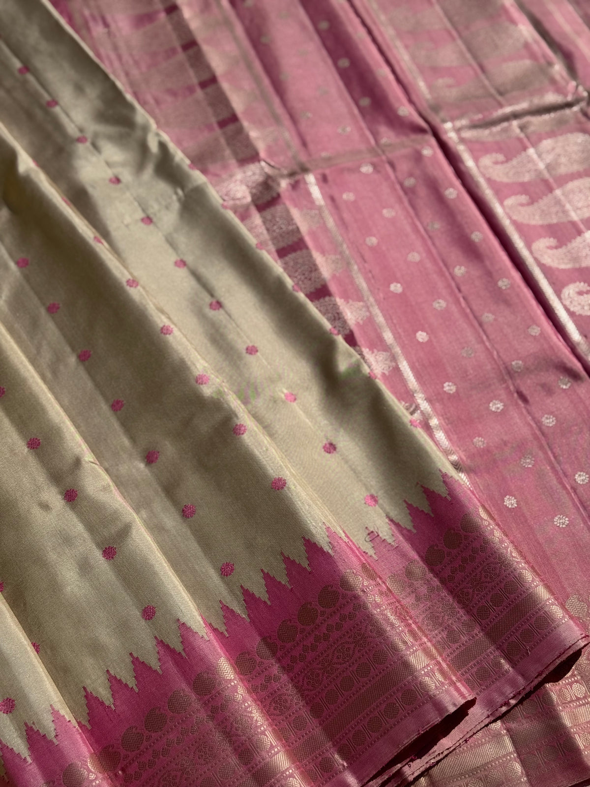 A soft and lustrous Handwoven kuttu gadwal silk saree in purple with red