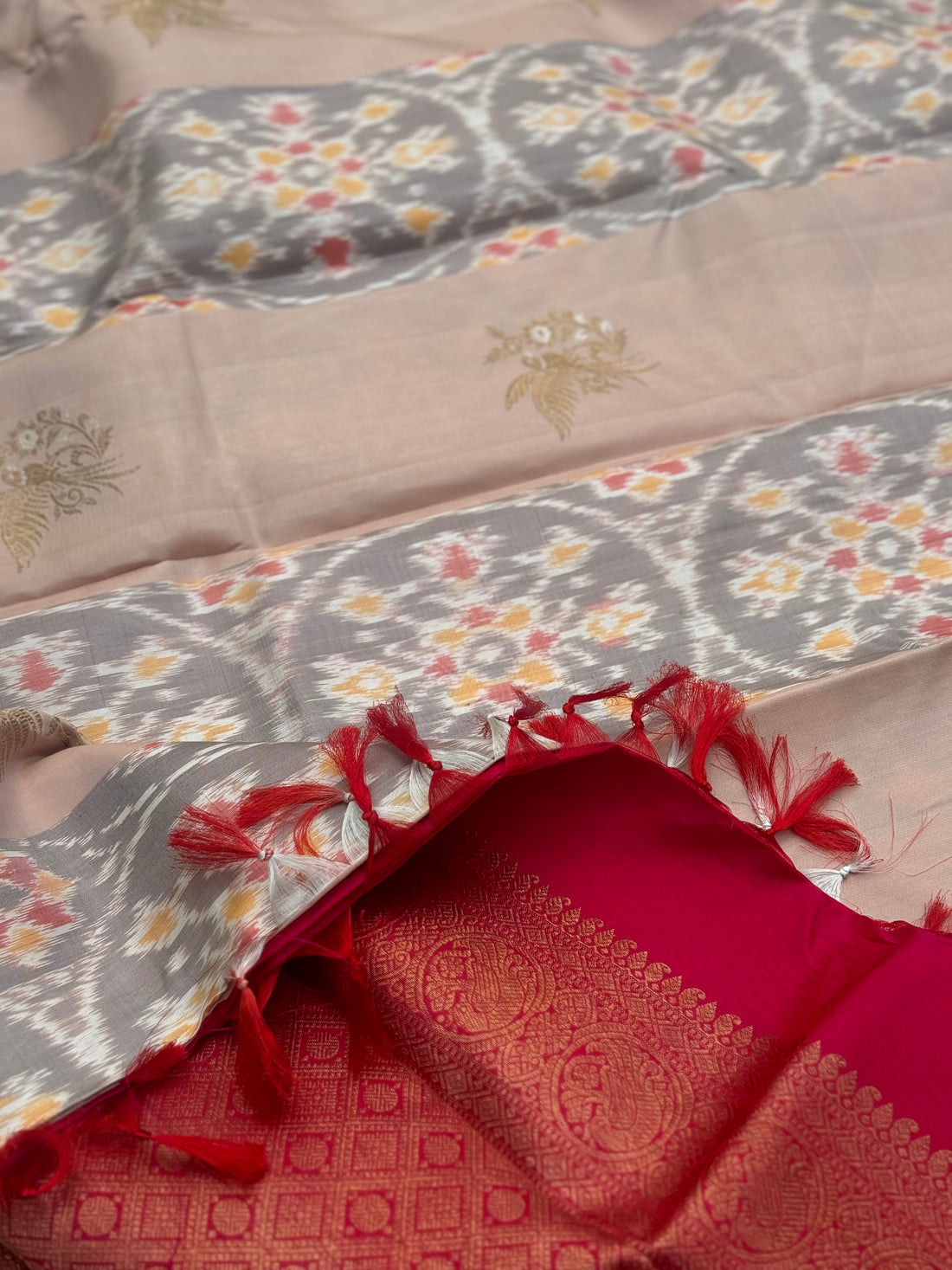 A gorgeous ovaltine shade with deep red kanchivaram borderless silk saree