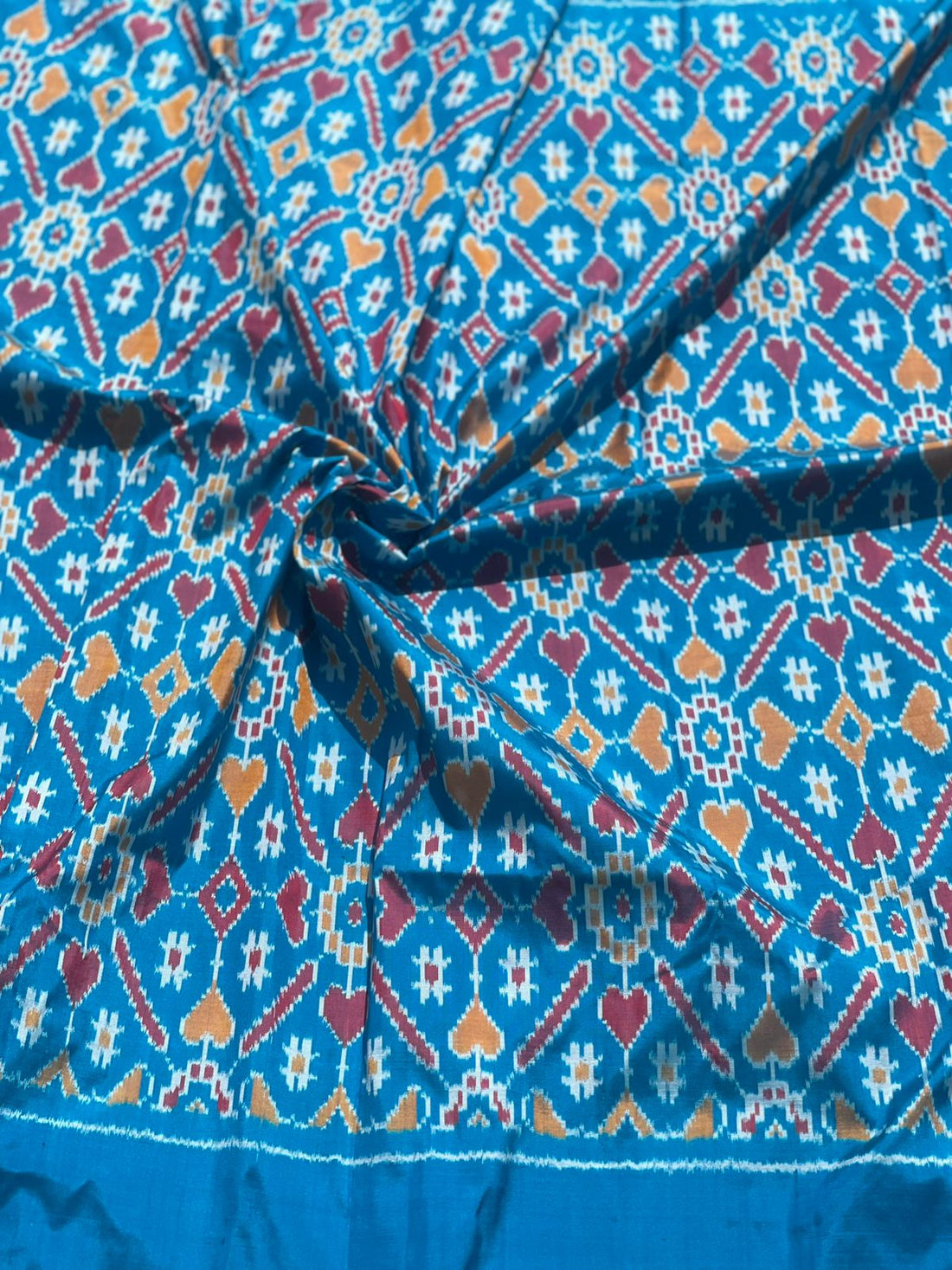 Sea Blue patola inspired navratan design Ikkat silk yardage