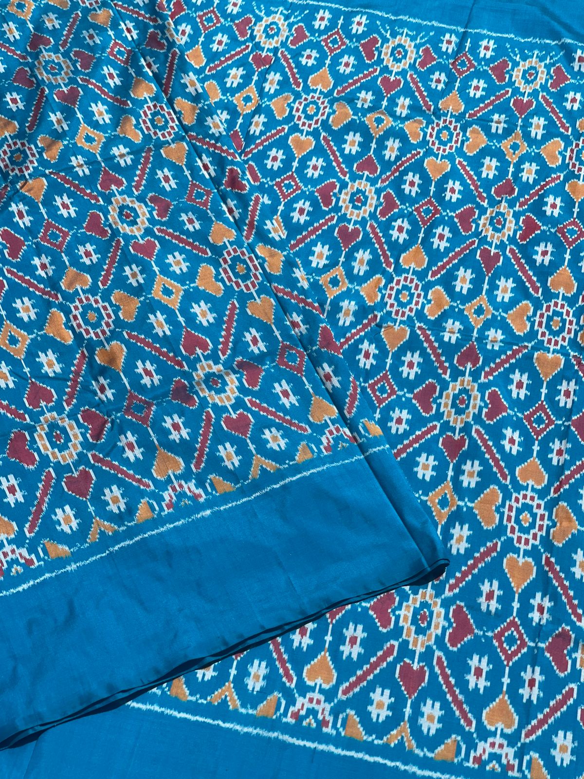Sea Blue patola inspired navratan design Ikkat silk yardage
