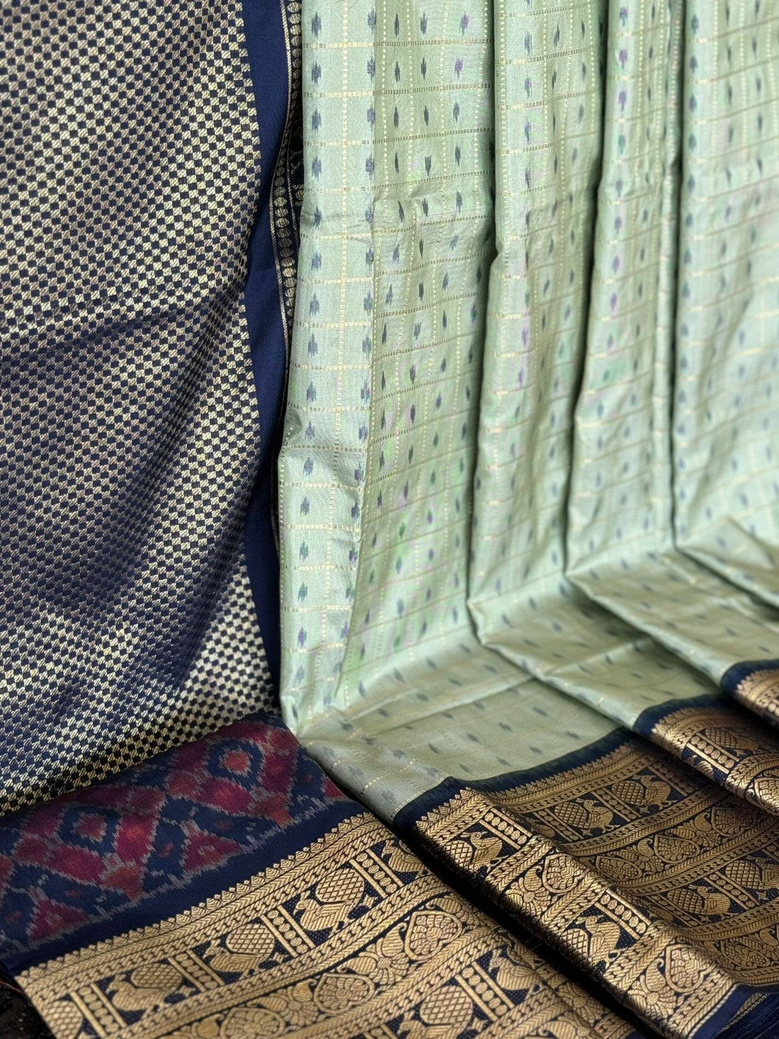 A masterpiece pastel green Zari checks with ikkat patola inspired ikkat with kanchi fusion pure handwoven silk saree