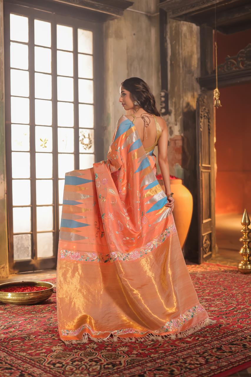 A stupendous kanchivaram silk saree in pastel lavender With authentic Parsi Gara work handmade with pearl/moti work