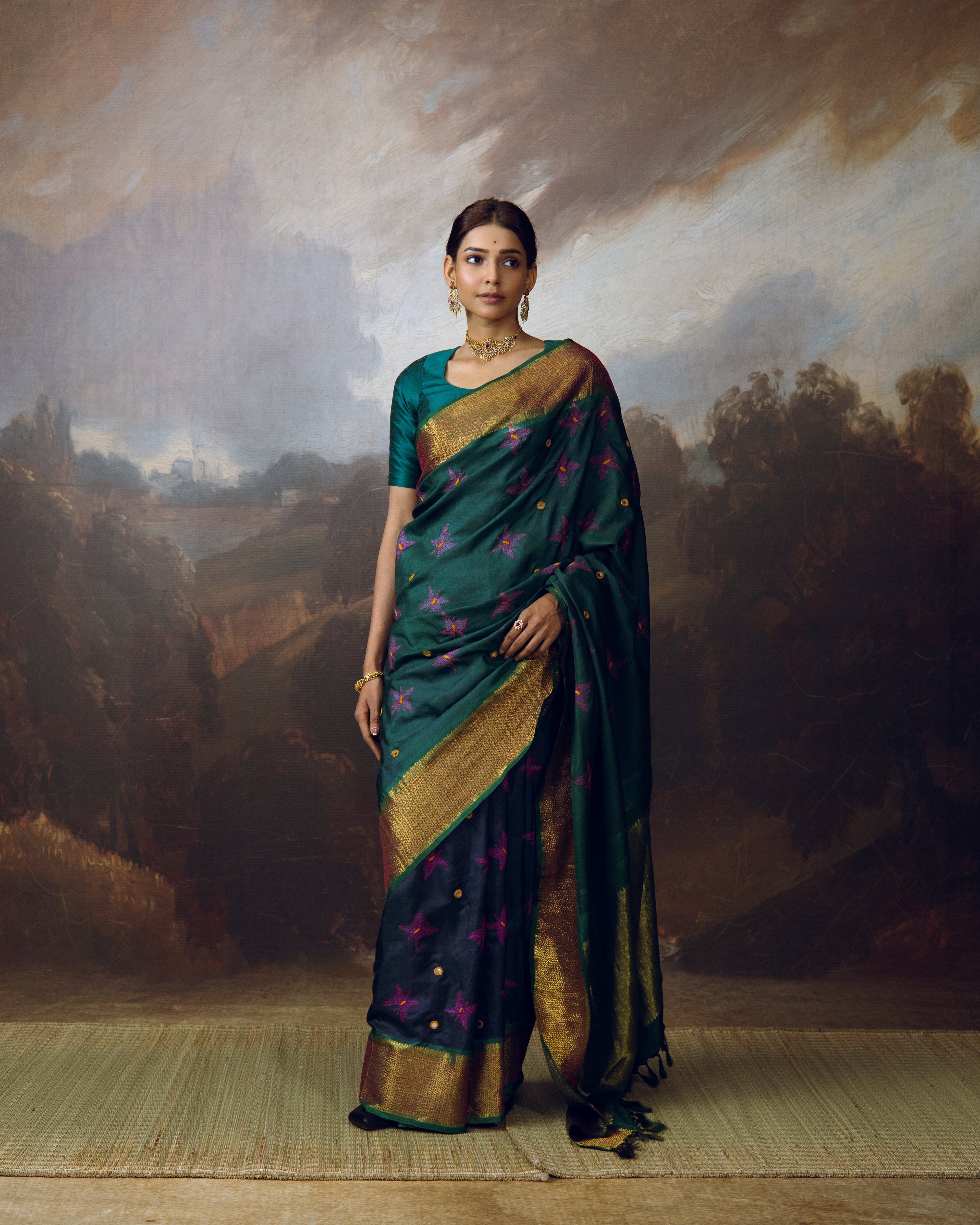The elegant NUI Shibori with Katha handembroidery on handwoven kanchivaram korvai silk saree