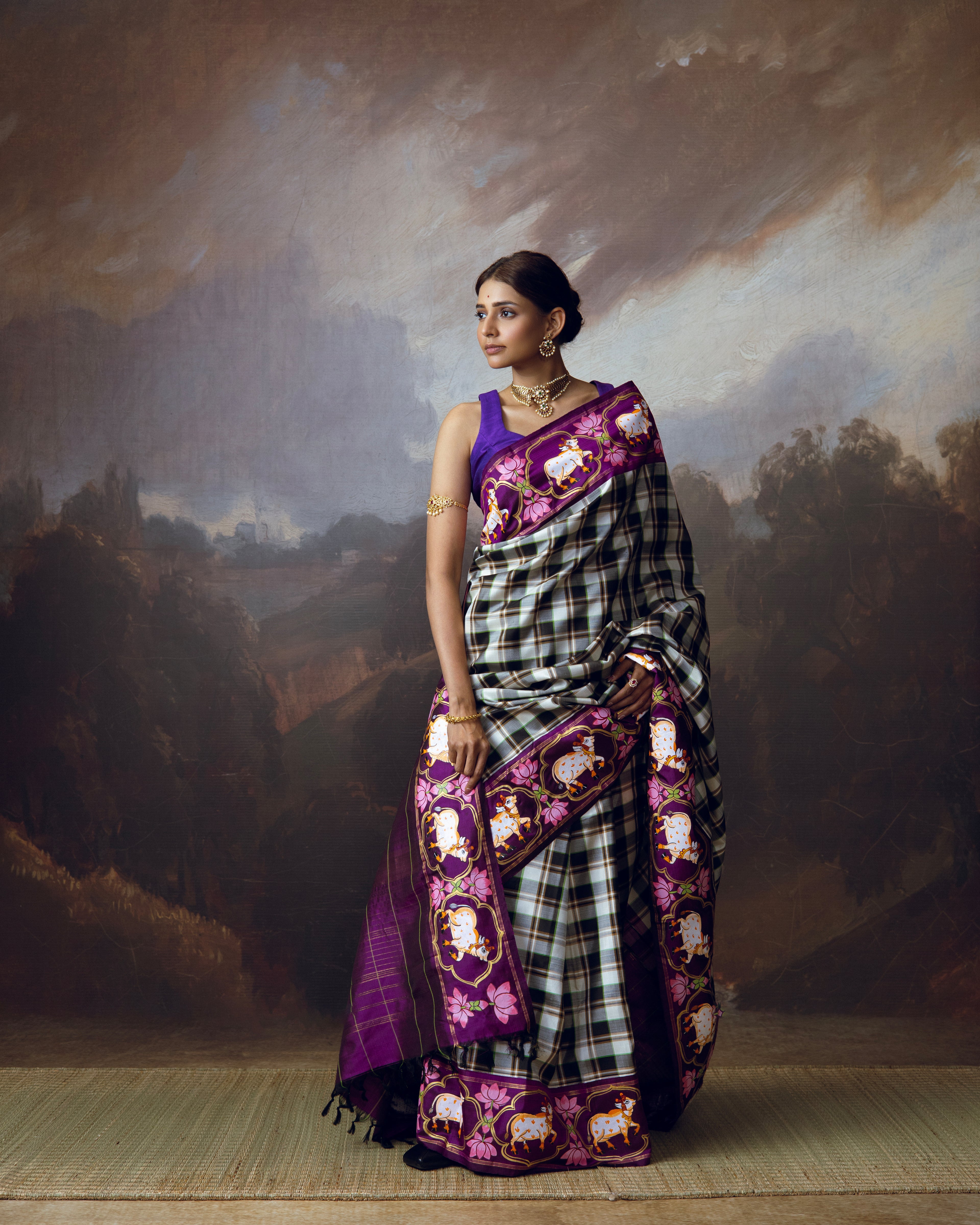 Burberry plaided korvai kanchivaram silk saree adorned with Handdrawn handpainted pichwai concept