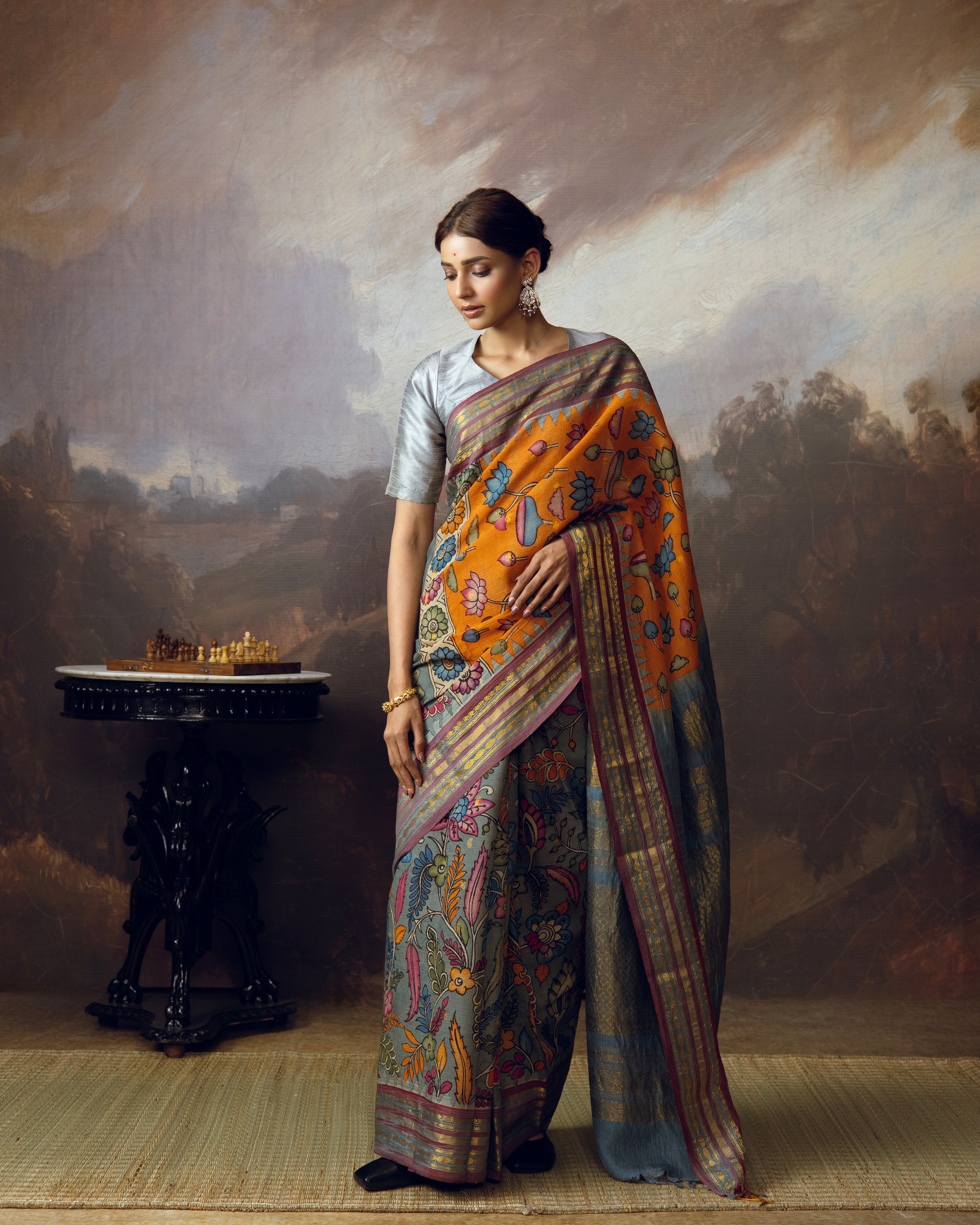 Handdrawn handpainted penkalamkari on silk cotton gadwal saree