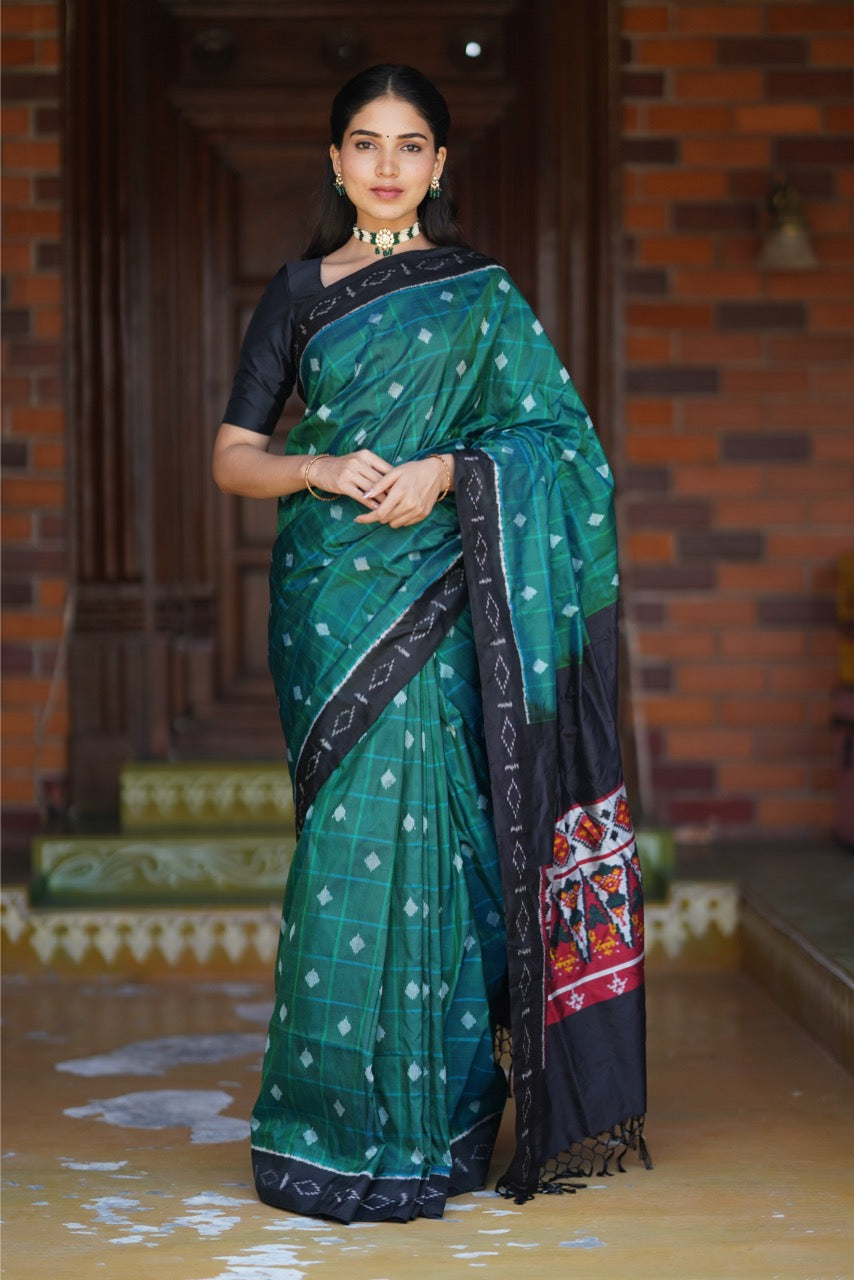 Contemporary silk Ikkat Saree in beautiful scarlet red with black